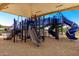The community playground has a modern play structure with slides and climbing areas at 9677 W Patrick Ln, Peoria, AZ 85383