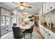 Open floor plan combining kitchen, dining, and living, providing a great flow to the home at 103 S 75Th Pl, Mesa, AZ 85208
