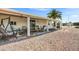 Relaxing covered patio with outdoor seating perfect for enjoying the desert scenery at 103 S 75Th Pl, Mesa, AZ 85208