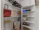 Organized closet with white shelving offering ample storage space for personal belongings at 10747 W Via Del Sol --, Peoria, AZ 85373