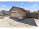 Detached two-car garage with concrete driveway and tile roof at 10747 W Via Del Sol --, Peoria, AZ 85373