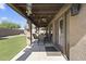 Covered patio featuring ceiling fan and lighting, perfect for outdoor lounging and entertaining at 10747 W Via Del Sol --, Peoria, AZ 85373