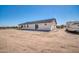 This new build home has a gravel yard at 11798 S 216Th Ave, Buckeye, AZ 85326