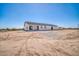 This new build home has a gravel yard at 11798 S 216Th Ave, Buckeye, AZ 85326