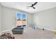 Spacious bedroom with sliding glass door leading to the outside, perfect for enjoying the natural light at 11798 S 216Th Ave, Buckeye, AZ 85326