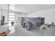 This garage has an epoxy floor with a trailer for hauling at 11798 S 216Th Ave, Buckeye, AZ 85326