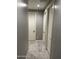 Hallway with neutral walls and doors at 11798 S 216Th Ave, Buckeye, AZ 85326