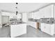Open kitchen featuring white cabinets and granite countertops at 11798 S 216Th Ave, Buckeye, AZ 85326