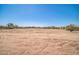 This expansive lot has been cleared and is ready for development with beautiful mountain views at 11798 S 216Th Ave, Buckeye, AZ 85326