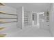 Basement is spacious with wooden storage shelves and painted brick walls at 1249 E Desert Park Ln, Phoenix, AZ 85020