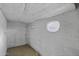 Plain white brick basement with minimal storage at 1249 E Desert Park Ln, Phoenix, AZ 85020