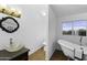 Bright bathroom featuring a free-standing tub, vessel sink, and large window at 1249 E Desert Park Ln, Phoenix, AZ 85020