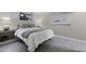 Bedroom with a stylish bed, soft lighting, and decorative pillows at 1249 E Desert Park Ln, Phoenix, AZ 85020