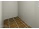 A small closet shows tile flooring and white walls at 1249 E Desert Park Ln, Phoenix, AZ 85020