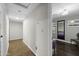 Bright hallway with earth-tone tiled floors leading into a stylishly furnished living area at 1249 E Desert Park Ln, Phoenix, AZ 85020