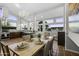 Open concept kitchen and dining area with a chandelier and ample natural light at 1249 E Desert Park Ln, Phoenix, AZ 85020
