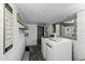 Well lit laundry room with 