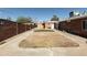 Spacious backyard featuring block walls for privacy, large patio, and small patch of artificial turf at 1330 E Monte Vista Rd, Phoenix, AZ 85006