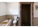 Bathroom featuring a bath tub and a tiled walk in shower at 1330 E Monte Vista Rd, Phoenix, AZ 85006