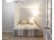 This quaint bedroom features tile floors and a comfortable bed at 1330 E Monte Vista Rd, Phoenix, AZ 85006