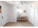 Bright bedroom featuring a built-in storage cabinet, a piano, and neutral walls at 1330 E Monte Vista Rd, Phoenix, AZ 85006