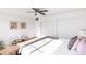 Bright bedroom featuring a ceiling fan, closet, seating, and plenty of natural light at 1330 E Monte Vista Rd, Phoenix, AZ 85006