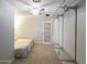 Bedroom features tile flooring, ceiling fan, walk in closet and easy access to bathroom at 1330 E Monte Vista Rd, Phoenix, AZ 85006
