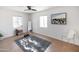Bright exercise room with two windows, a clear chair, and a decorative gray rug at 1330 E Monte Vista Rd, Phoenix, AZ 85006