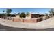 Corner lot featuring a well-maintained red brick exterior and decorative metal fencing at 1330 E Monte Vista Rd, Phoenix, AZ 85006