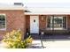 Charming exterior view showcasing the brick facade, tidy landscaping and front door at 1330 E Monte Vista Rd, Phoenix, AZ 85006