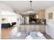 Open-concept kitchen with stainless steel appliances flowing into living area at 1330 E Monte Vista Rd, Phoenix, AZ 85006