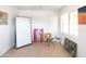 Bright living room featuring tile floors, white walls, and natural light from a large window at 1330 E Monte Vista Rd, Phoenix, AZ 85006
