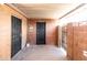 Private brick outdoor area with secure doors and covered awning at 1330 E Monte Vista Rd, Phoenix, AZ 85006