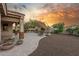 Beautiful backyard with a cozy seating area, built-in grill, and expansive patio perfect for outdoor gatherings at 13583 S 177Th Ln, Goodyear, AZ 85338