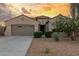 Charming single-story home with a well-manicured lawn and inviting curb appeal at 13583 S 177Th Ln, Goodyear, AZ 85338