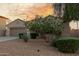 Charming single-story home with a desert landscape and an attached two-car garage at 13583 S 177Th Ln, Goodyear, AZ 85338