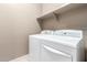 Washer and Dryer with shelf in the laundry room at 13583 S 177Th Ln, Goodyear, AZ 85338