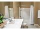 Bathroom showcasing a tub-shower combination with a modern white shower curtain at 1367 S Country Club Dr # 1127, Mesa, AZ 85210