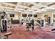 Spacious fitness center with modern exercise equipment and multiple wall mounted televisions at 1367 S Country Club Dr # 1127, Mesa, AZ 85210