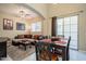 Cozy living room complemented by an adjacent dining area, offering a comfortable gathering space at 1367 S Country Club Dr # 1127, Mesa, AZ 85210