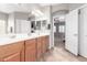 The bathroom boasts double sinks with an open entry into the main bedroom at 1429 E Lowell Ave, Gilbert, AZ 85295