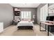 Brightly lit bedroom with a desk, vanity, stuffed animals, and shelving at 1429 E Lowell Ave, Gilbert, AZ 85295
