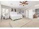 Tranquil bedroom with ample light, a ceiling fan, and neutral decor at 1429 E Lowell Ave, Gilbert, AZ 85295