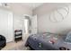 This bedroom has a basketball decor, sports themed bedspread, and direct access to other rooms at 1429 E Lowell Ave, Gilbert, AZ 85295