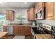 Modern kitchen with stainless steel appliances and ample countertop space at 1429 E Lowell Ave, Gilbert, AZ 85295