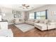 Bright living room featuring hardwood floors, neutral tones, and comfortable seating at 1429 E Lowell Ave, Gilbert, AZ 85295