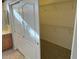 Walk-in closet boasts shelving and carpeted floors at 15801 W Goldenrod Dr, Surprise, AZ 85374