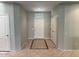 Bright and welcoming foyer featuring tile floors with decorative tile accents at 15801 W Goldenrod Dr, Surprise, AZ 85374