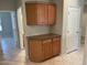 Kitchen with cabinets and granite counters at 15801 W Goldenrod Dr, Surprise, AZ 85374