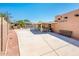 Spacious backyard with a hot tub and large concrete area, perfect for relaxing and entertaining at 16425 N 46Th Dr, Glendale, AZ 85306
